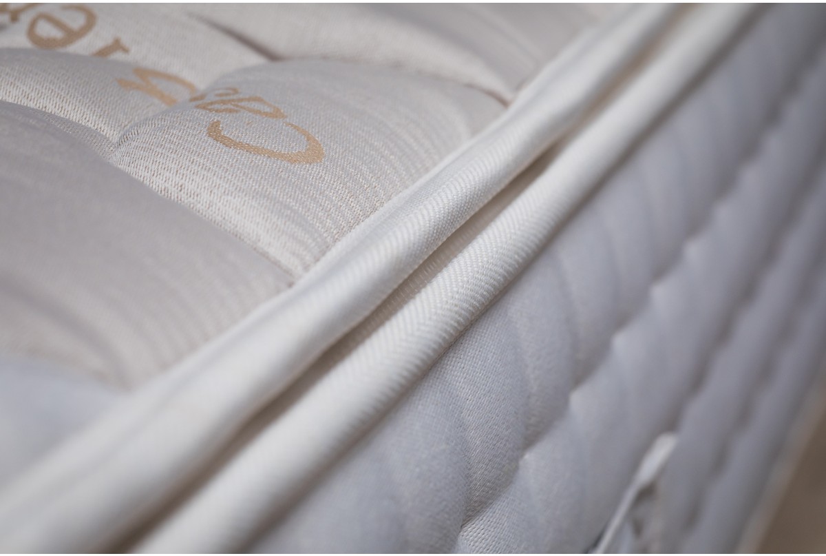 bed with cashmere on mattress